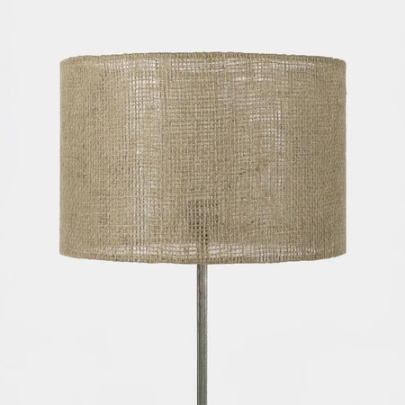 Natural woven jute lampshade on white background