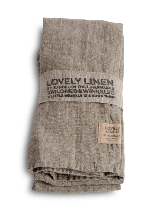 A pack of four beige Lovely Linen tailored wrinkled napkins, with a label showing the brand name and 'Tailored & Wrinkled'. They are folded and displayed on a white background.
