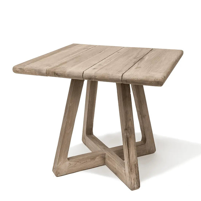 Teak bistro table with natural grey patina on white background