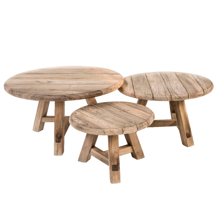 Three natural teak outdoor coffee tables by Gommaire on a white background