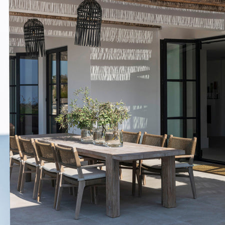 Luxury outdoor dining set in natural grey teak by Gommaire