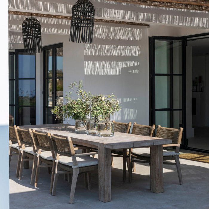 Luxury outdoor dining set in natural grey teak by Gommaire