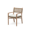 Chair with woven backrest and armrests and a white cushion on a white background