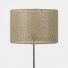 Natural woven jute lampshade on white background
