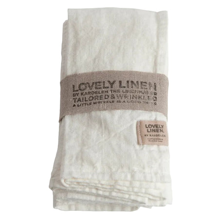 A pack of white linen napkins with a natural slightly wrinkled look by Lovely Linen