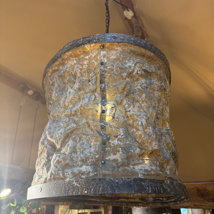 Large drum ceiling light crafted from rustic metal and parchment-style fabric