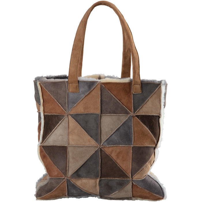Patchwork tote bag with geometric pattern on a white background