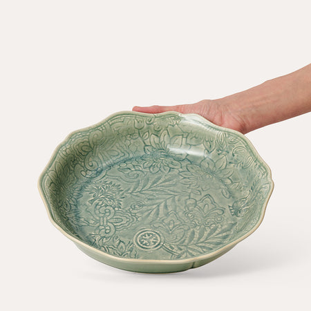 Pale green decorative glazed ceramic pie dish