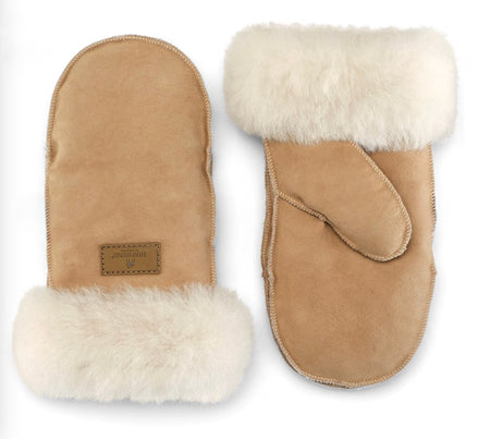 Pair of tan suede and sheepskin mittens with white fur trim on a white background
